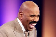 Steve Harvey laughing in an episode of 'Family Feud'