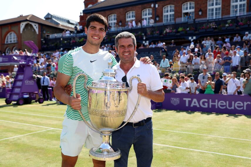 LONDON, ENGLAND - JUNE 25: Carlos Alcaraz of Spain poses with the winner's trophy alongside father, Carlos Snr. after victory against Alex De Minaur of Australia in the Men's Singles Final match on Day Seven of the cinch Championships at The Queen's Club on June 25, 2023 in London, England. (Photo by Luke Walker/Getty Images for LTA)