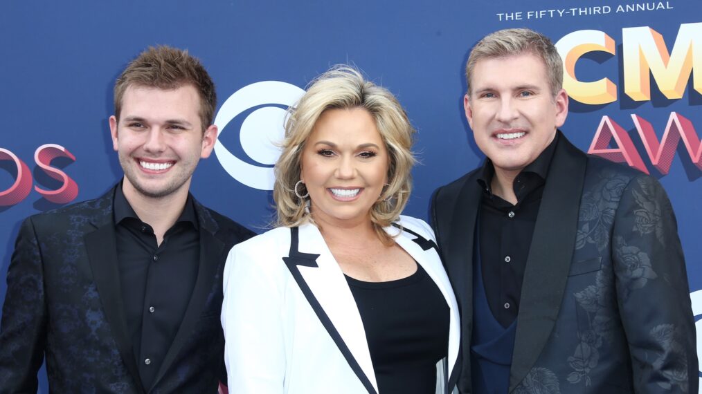 Chase, Julie, and Todd Chrisley at event