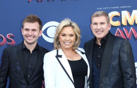 Chase, Julie, and Todd Chrisley at event