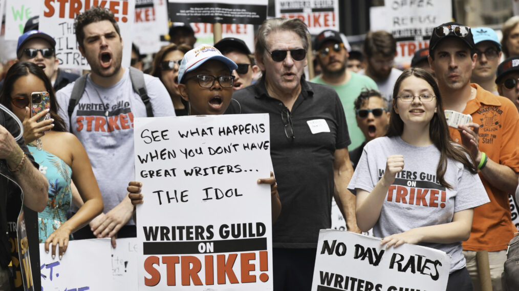 Members of the Writers Guild of America East picket at the Warner Bros. Discovery office in New York City on July 13, 2023