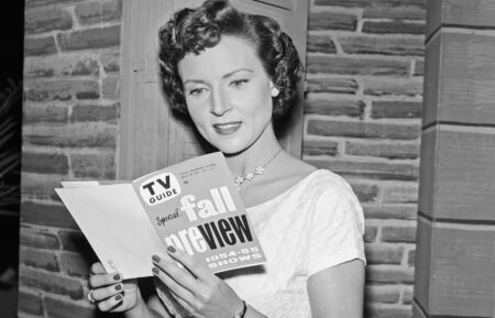 Betty White holding a copy of 'TV Guide Magazine's Fall Preview