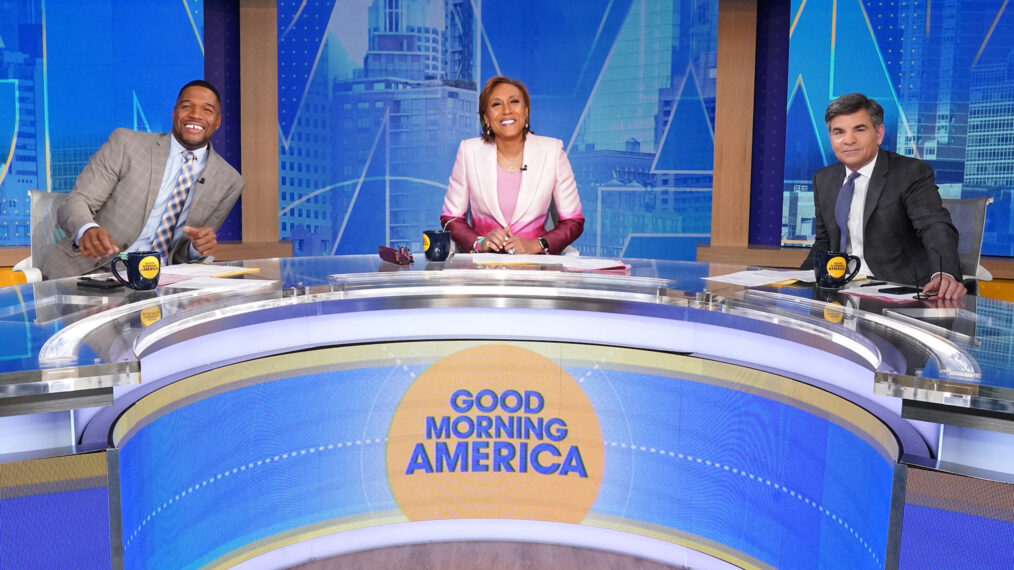 Michael Strahan, Robin Roberts, and George Stephanopolous hosting 'Good Morning America' on ABC