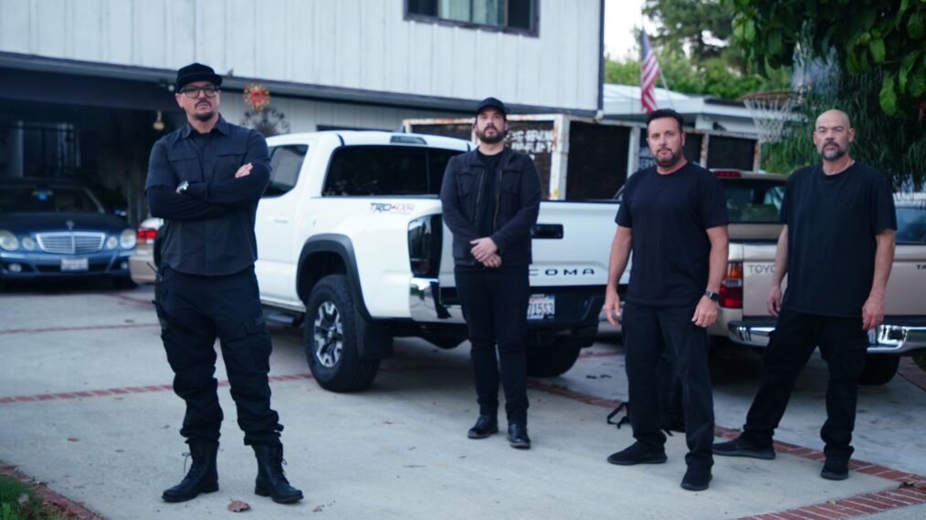 Zak, Aaron, Billy, and Jay posing in front of residents home in Northridge