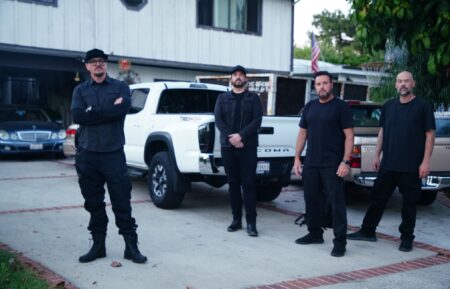 Zak, Aaron, Billy, and Jay posing in front of residents home in Northridge