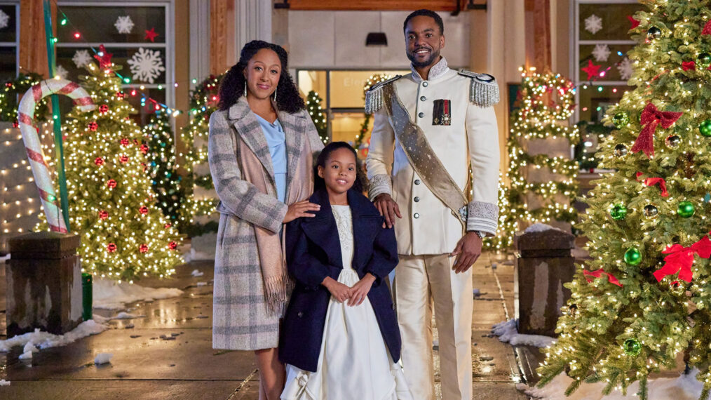 Tamera Mowry-Housley, Ronnie Rowe, and Isabel Birch in 'Inventing The Christmas Prince'