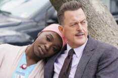 Folake Olowofoyeku and Billy Gardell in 'Bob Hearts Abishola' - 'Uncharted Waters of Mediocrity'