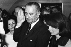 Lyndon Baines Johnson is sworn in as the 36th President of the United States of America on board the presidential airplane, after the assassination of President John F Kennedy. Mrs Johnson is behind him, left, and to his right is the grief stricken Jackie Kennedy.