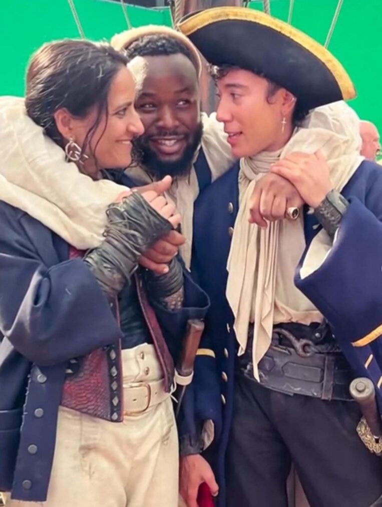 Madeleine Sami, Samson Kayo, and Vico Ortiz behind the scenes of 'Our Flag Means Death' Season 2