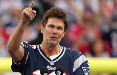 Former New England Patriots quarterback Tom Brady speaks during a ceremony honoring him at halftime of New England's game against the Philadelphia Eagles at Gillette Stadium on September 10, 2023 in Foxborough, Massachusetts