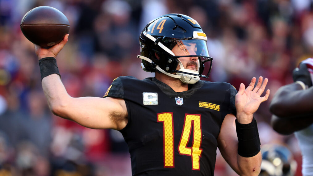 Quarterback Sam Howell #14 of the Washington Commanders passes against the New York Giants in the second half at FedExField on November 19, 2023 in Landover, Maryland.