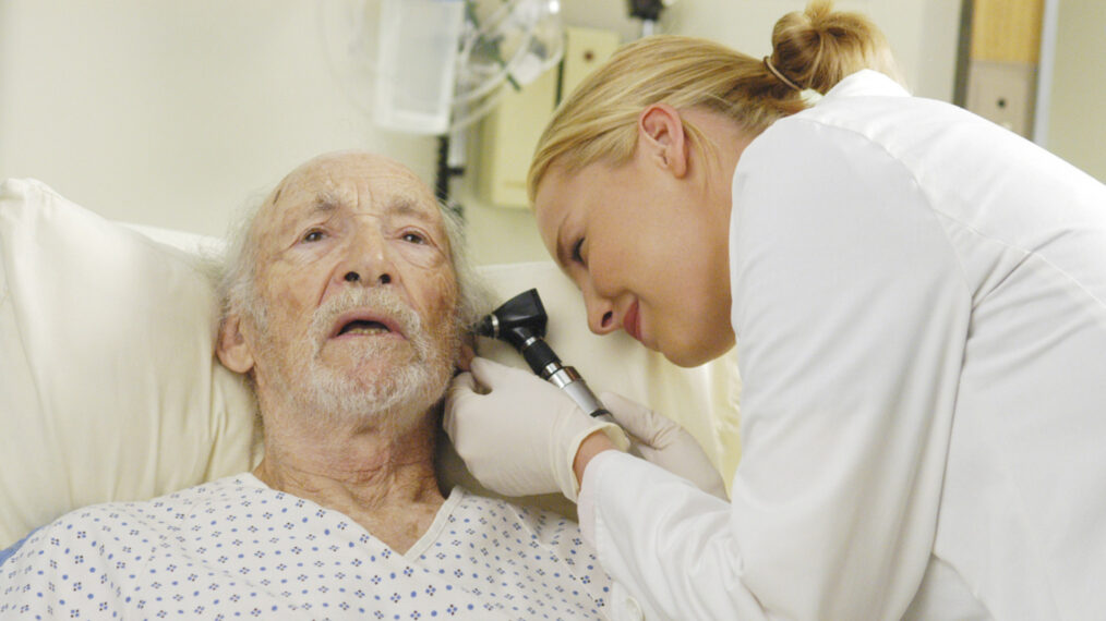 Jack Axelrod as Charlie Yost and Katherine Heigl as Izzie Stevens on 'Grey's Anatomy'