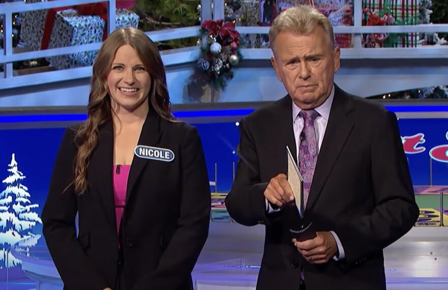 Pat Sajak with Wheel of Fortune contestant Nicole