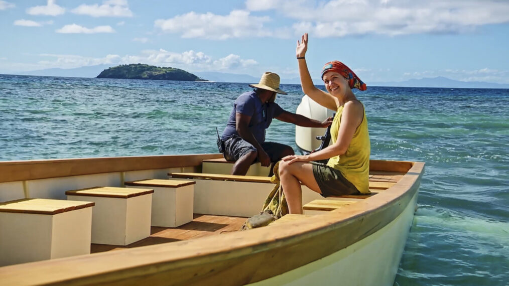 Emily Flippen waves while sitting on a boat in 'Survivor' Season 45 Episode 11