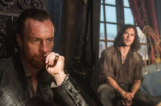 Toby Stephens as Captain Flint and Luke Arnold as John Silver in 'Black Sails'