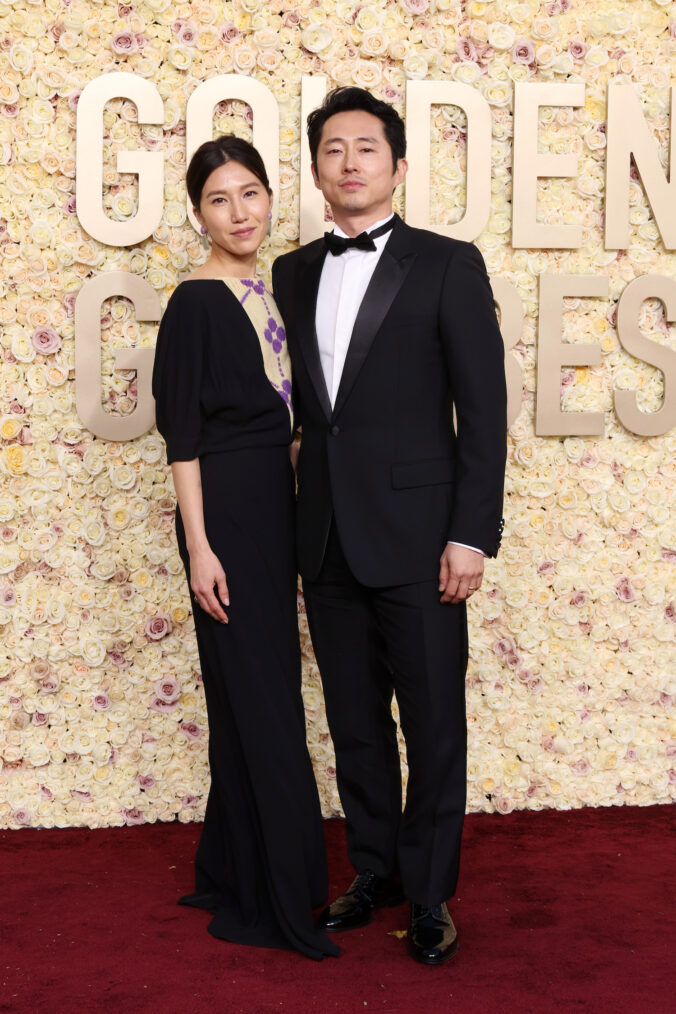 Joana Pak and Steven Yeun attend the 81st Annual Golden Globe Awards