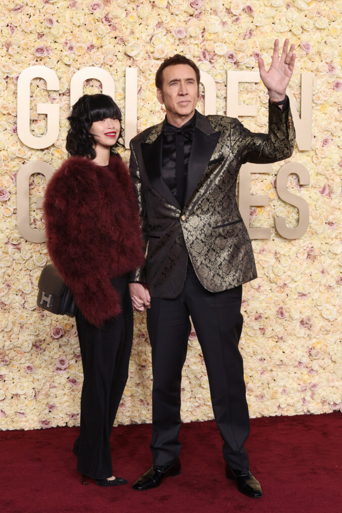 Riko Shibata and Nicolas Cage attend the 81st Annual Golden Globe Awards