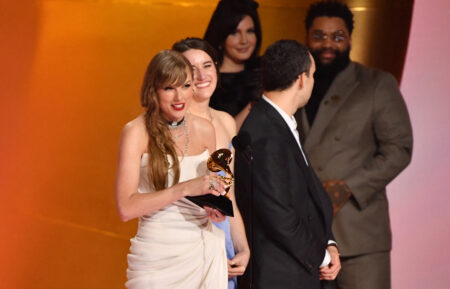 Taylor Swift accepts the Album Of The Year award for 'Midnights' on stage during the 66th Annual Grammy Awards