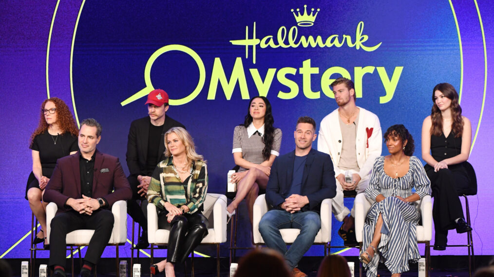 Elizabeth Yost, Paul Campbell, Aimee Garcia, Danny Griffin, Ali Skovbye, Victor Webster, Alison Sweeney, Luke Macfarlane, and Lyndie Greenwood at a Hallmark Mystery presentation at the TCA Winter Press Tour