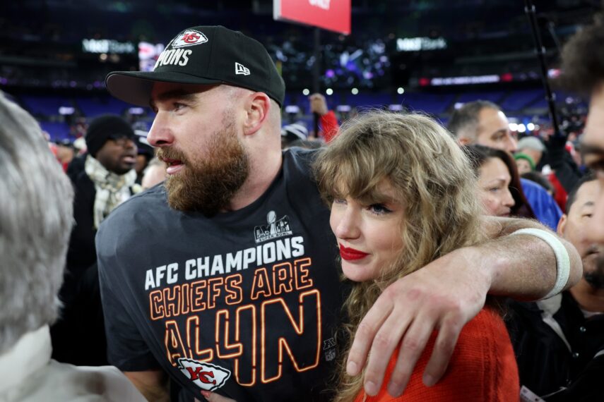 Travis Kelce and Taylor Swift on the field after the 2024 AFC Championship game