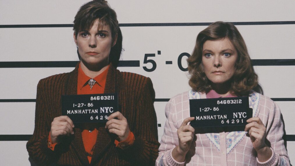 American actresses Susan Saint James (as Kate McArdle) and Jane Curtin (as Allie Lowell) pose for mugshots in a scene from the television sitcom 'Kate & Allie,' New York, New York, 1988