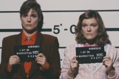 American actresses Susan Saint James (as Kate McArdle) and Jane Curtin (as Allie Lowell) pose for mugshots in a scene from the television sitcom 'Kate & Allie,' New York, New York, 1988