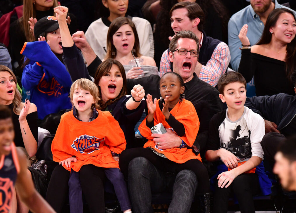 Mariska Hargitay and Peter Hermann sit courtside with children Amaya Hermann, Andrew Hermann and August Hermann at the New York Knicks vs Boston Celtics game at Madison Square Garden on February 24, 2018 in New York City.