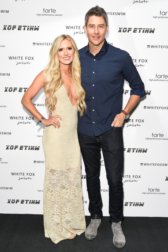 Lauren Burnham and Arie Luyendyk attend White Fox Boutique Swimwear Launch Of 100% Salty at Catch on July 26, 2018 in West Hollywood, California.