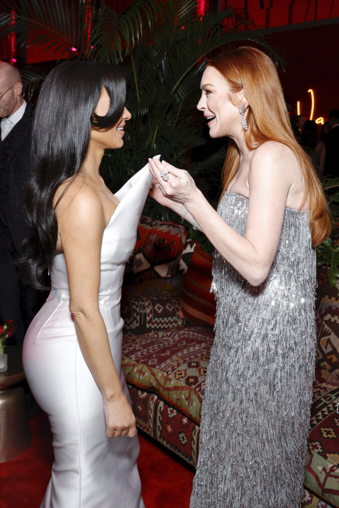 Kim Kardashian and Lindsay Lohan attend the 2024 Vanity Fair Oscar Party Hosted By Radhika Jones at Wallis Annenberg Center for the Performing Arts on March 10, 2024 in Beverly Hills, California.