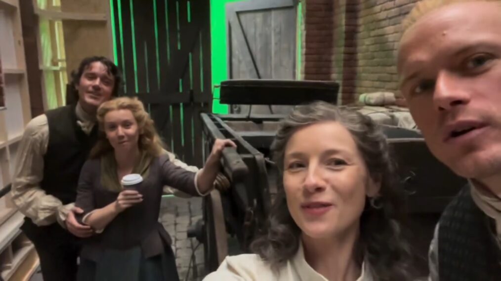 Cesar Domboy, Lauren Lyle, Caitriona Balfe, and Sam Heughan behind the scenes of 'Outlander' Season 8