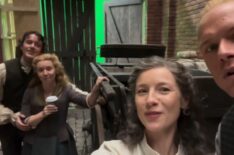 Cesar Domboy, Lauren Lyle, Caitriona Balfe, and Sam Heughan behind the scenes of 'Outlander' Season 8