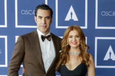 Sacha Baron Cohen and Isla Fisher pose for a photo during a screening of the Oscars on Monday April 26, 2021 in Sydney, Australia.