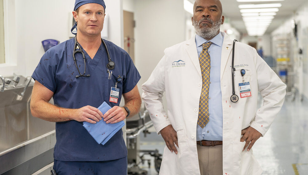 Josh Lawson as Dr. Bruce, David Alan Grier as Dr. Ron - St. Denis Medical