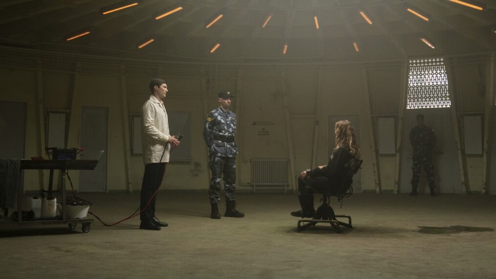 Andrei Nova as Technician, Robert Luckay as Pavel, and Teri Polo as Vanessa Kincaide in 'FBI: International' Season 3 Episode 12 