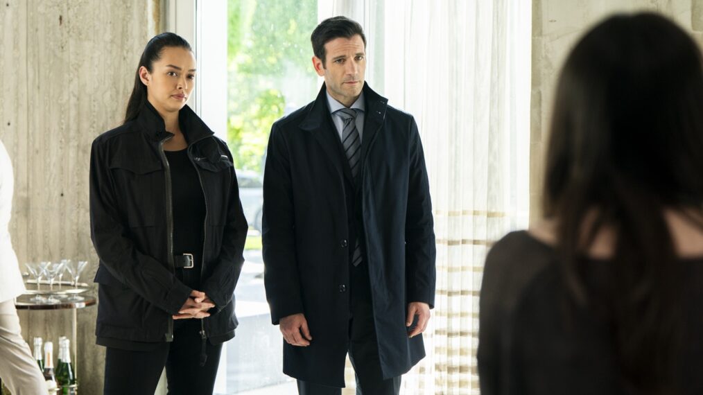 Vinessa Vidotto as Special Agent Cameron Vo and Colin Donnell as Brian Lange in 'FBI: International' Season 3 Episode 12 