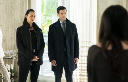 Vinessa Vidotto as Special Agent Cameron Vo and Colin Donnell as Brian Lange in 'FBI: International' Season 3 Episode 12 