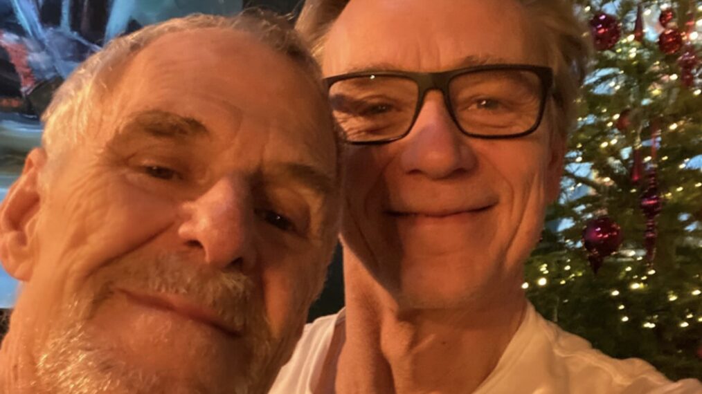 Married actors Ian Gelder and Ben Daniels pose for a selfie in front of their Christmas tree