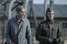 Jonah Hauer-King as Lali Sokolov & Jonas Nay as Nazi Officer Stefan Baretzki in 'The Tattooist of Auschwitz'