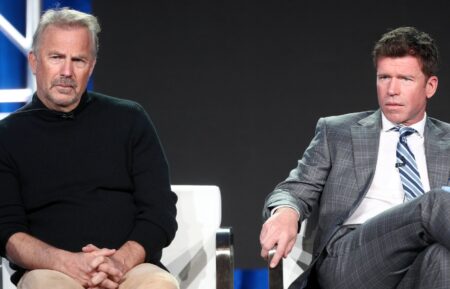 Kevin Costner and Taylor Sheridan on stage