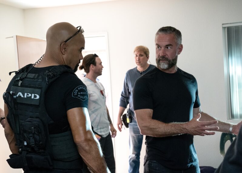 Shemar Moore as Daniel "Hondo" Harrelson and Director Jay Harrington behind the scenes of 'S.W.A.T.' Season 7 Episode 12 "Allegiance"