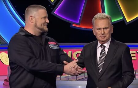 Wheel of Fortune Pat Sajak and contestant