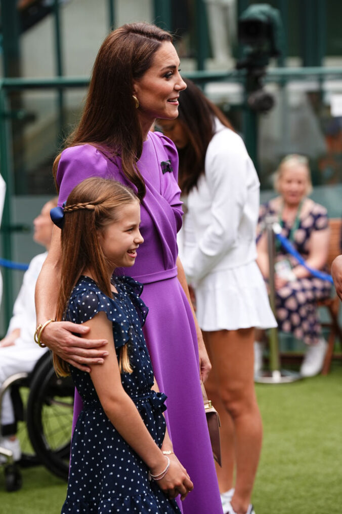 LONDON, ENGLAND - JULY 14: Catherine, Princess of Wales and Princess Charlotte during a visit to the All England Lawn Tennis and Croquet Club in Wimbledon, south west London, on day fourteen of the Wimbledon Tennis Championships on July 14, 2024 in London, England. The Princess of Wales will present the trophy to the winner of the men's final. (Photo by Aaron Chown - WPA Pool/Getty Images)