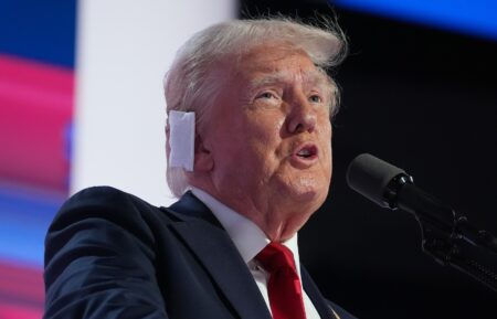 Donald Trump with ear patch giving speech at the RNC