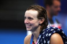 Katie Ledecky of Team United States smiles as she looks on during a Swimming Training Session ahead of the Paris 2024 Olympic Games