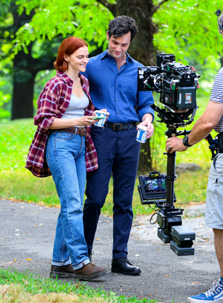 Madeline Brewer and Penn Badgley are seen on the film set of the 'You' in Central Park, Manhattan on July 15, 2024 in New York City.