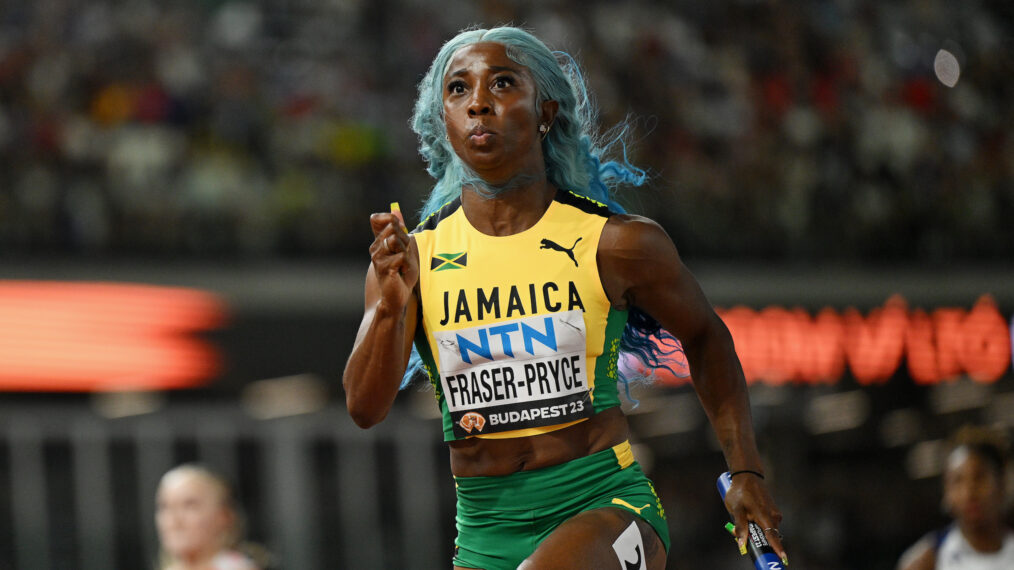 Shelly-Ann Fraser-Pryce of Team Jamaica competes in the Women's 4x100m Heats during day seven of the World Athletics Championships Budapest 2023 at National Athletics Centre on August 25, 2023 in Budapest, Hungary.