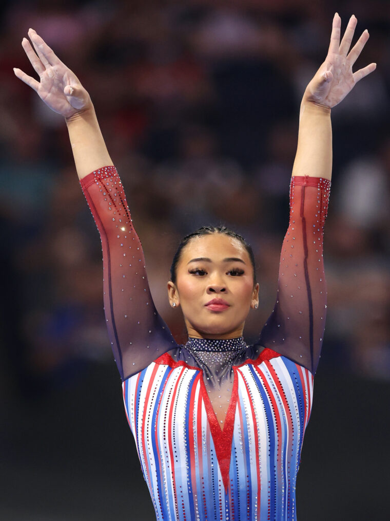 Sunisa Lee celebrates after competing on the balance beam on Day Two of the 2024 U.S. Olympic Team Gymnastics Trials at Target Center on June 28, 2024 in Minneapolis, Minnesota.