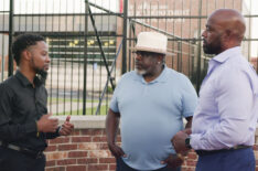 Cedric The Entertainer and his longtime friend, retired lead task force officer Captain Ron Johnson, speak with Alderman Rasheen Aldridge, Jr. during the filming of '!3 Days in Ferguson' on CBS
