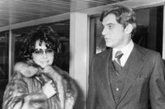 Actress Elizabeth Taylor with her seventh husband, John Warner, arriving at Heathrow Airport for a family christmas in London.