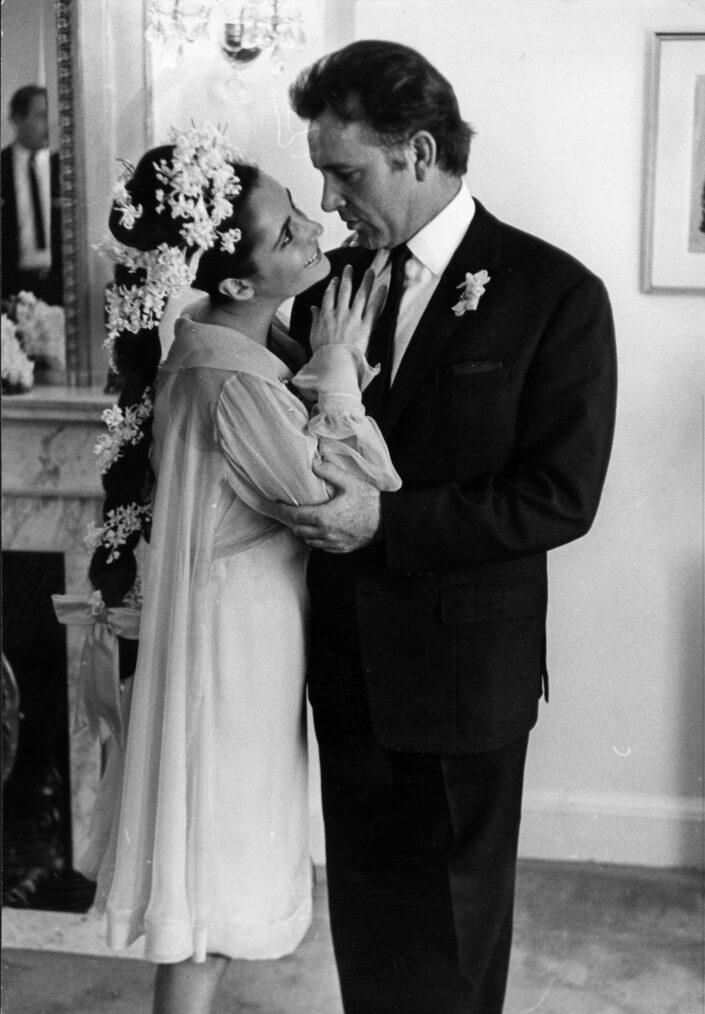 British film stars Elizabeth Taylor (1932 - 2011) and Richard Burton (1925 - 1984) at their first wedding in Montreal, Canada. They married twice, but both marriages ended in divorce.